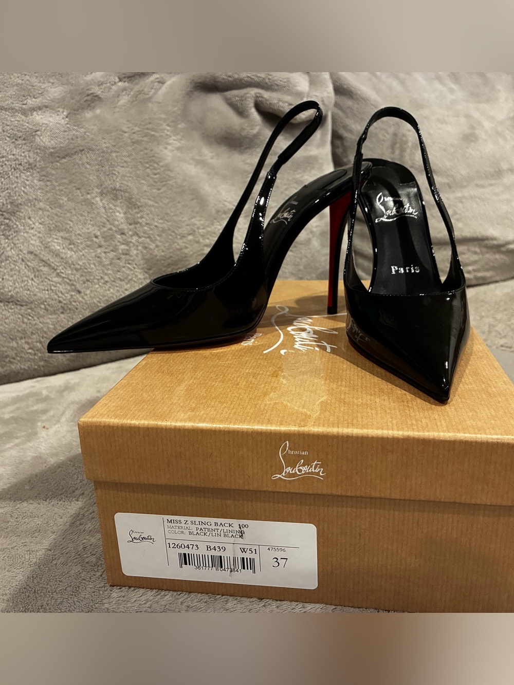 Christian Louboutin Black Patent Slingback Pumps with Red Sole